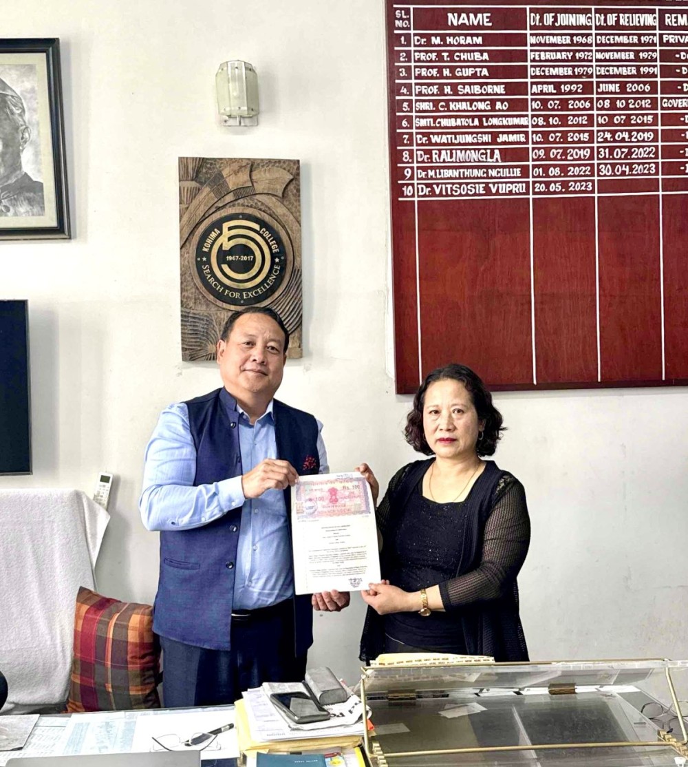 Dr Elizabeth Walling of SCTE, and Dr Vitsosie Vupru of  Kohima College during the signing of Memorandum of Collaboration between the two institutions on May 13.  (Photo Courtesy: Kohima College)
